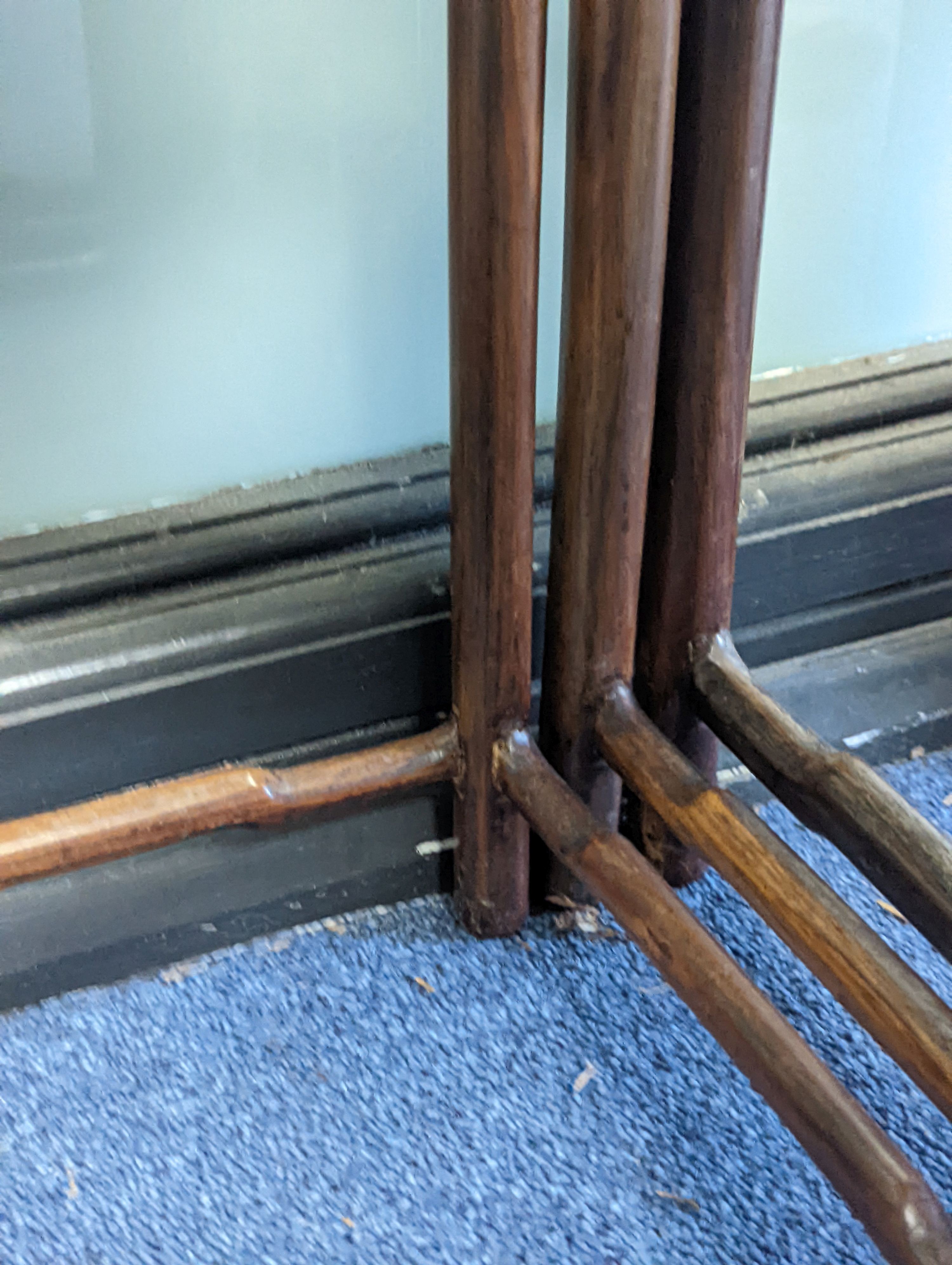 A nest of three Chinese hardwood tables, width 40cm, depth 32cm, height 59cm
